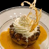 Whiskey Whipped Brioche Bread Pudding · Chocolate chips, whiskey sauce, whipped cream, caramel halo