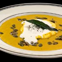 Kabocha Squash Soup · savory crème fraiche, pepitas, fried sage