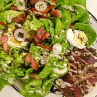 Hawaiian Ahi Nicoise Salad · yellowtail ahi, living butter lettuce, warm bacon, heirloom tomatoes, hard-boiled egg, olive...
