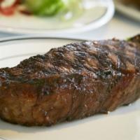 Prime New York Strip (16oz) · signature steaks are served with choice of creamed spinach, creamed corn, or broccoli