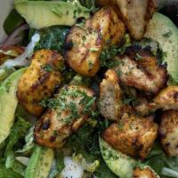 Chicken Kebab Salad · Our house salad topped with chicken kebab and avocado.
