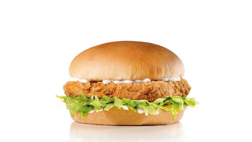 Spicy Chicken Sandwich · Spicy Chicken, lettuce and mayonnaise on a plain bun.