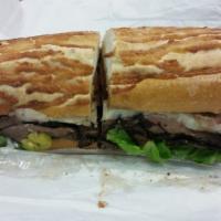 Chop Chop Sandwich · Turkey, salami and provolone melted together with Caesar dressing and pepperoncinis. Include...
