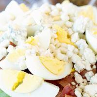 Cobb Salad · Chicken breast, eggs, bacon and blue cheese.  Served with our sun-dried tomato tapenade dres...