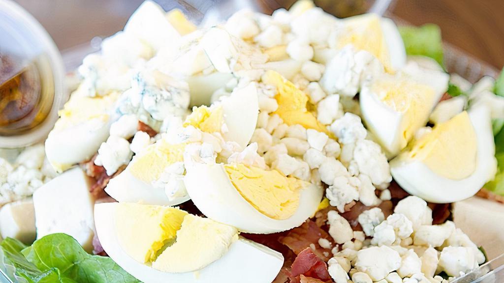 Cobb Salad · Chicken breast, eggs, bacon and blue cheese.  Served with our sun-dried tomato tapenade dressing on the side.