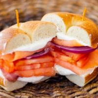 The Lox & Bagel · Cream cheese, sliced lox, tomato, onion, and caper on a toasted.