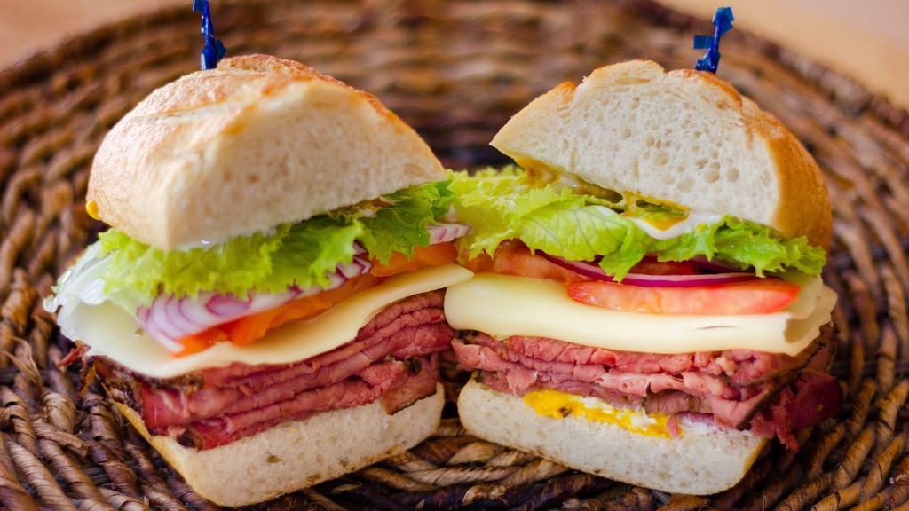 Hot Pastrami · Melted swiss cheese, tomato, lettuce, dill pickle, mayo, and mustard.