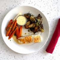 Fresh Wild Alaskan Halibut · with choice of two sides