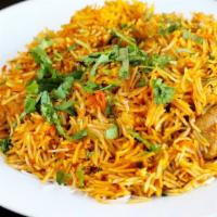 Vegetable Biryani · Saffron flavored basmati rice with vegetables and nuts