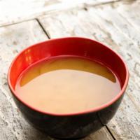 Miso Soup 味噌汁 · With tofu and seaweed.