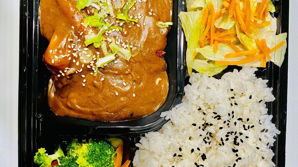 Chicken katsu curry · Chicken panko (crispy panko breaded) with homemade curry sauce, white sesame, green onion, shredded cabbage, and over rice.