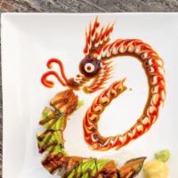 Dragon Roll · Shrimp tempura roll and cucumber topped unagi, avocado.