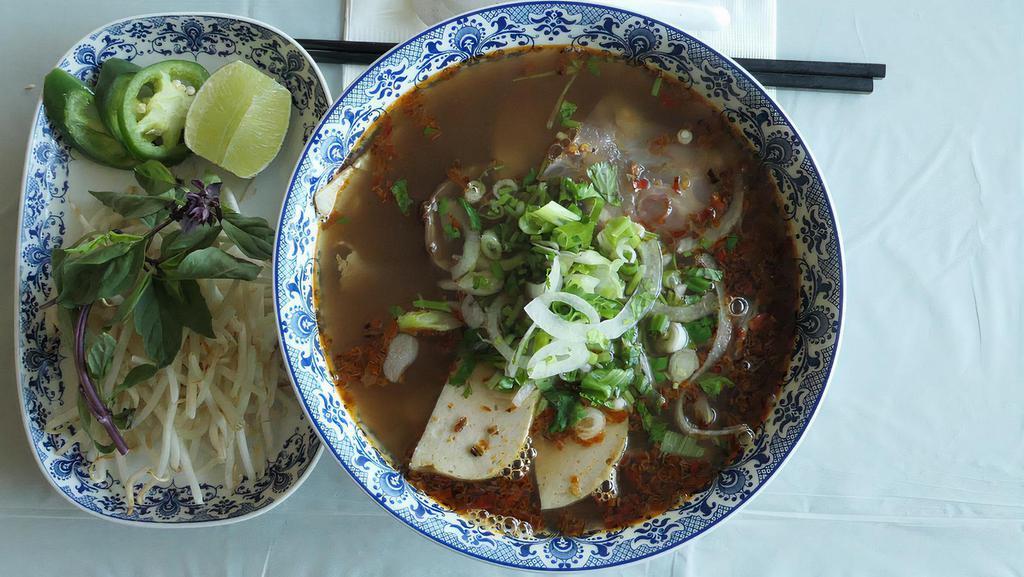 #40. Beef Lemon Grass Vermicelli · Spicy. Beef and pork in spicy broth served with traditional garnish plus mint and shredded cabbage.