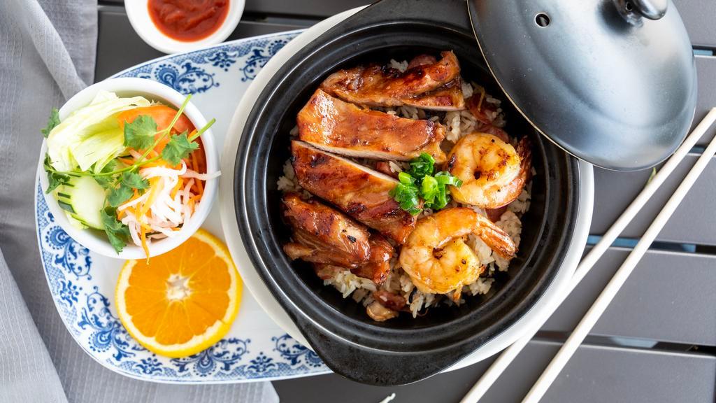 #28A. Special Clay Pot Rice · Seasoned steamed rice sautéed with shiitake mushrooms, ginger, Chinese sausage and choice of BBQ pork, chicken, beef or grilled shrimp.