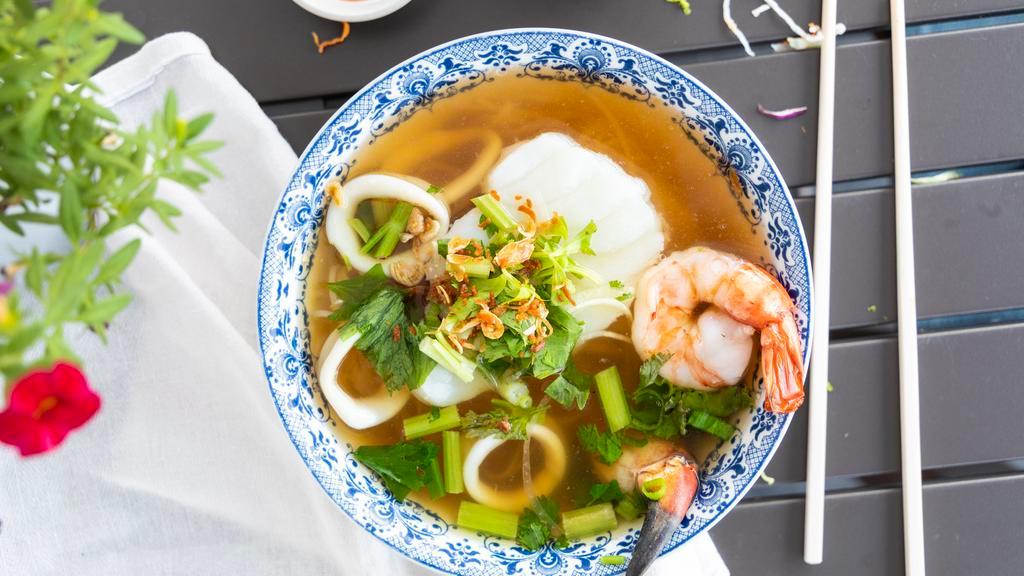 #28. Combination Seafood Noodle Soup · Gluten-free. Chilean sea bass or salmon, jumbo prawn, jumbo Alaskan snow crab claw and wild caught squid in savory homemade broth. Served with fresh garnish. Choice of rice or clear noodles or egg noodles (contains gluten).