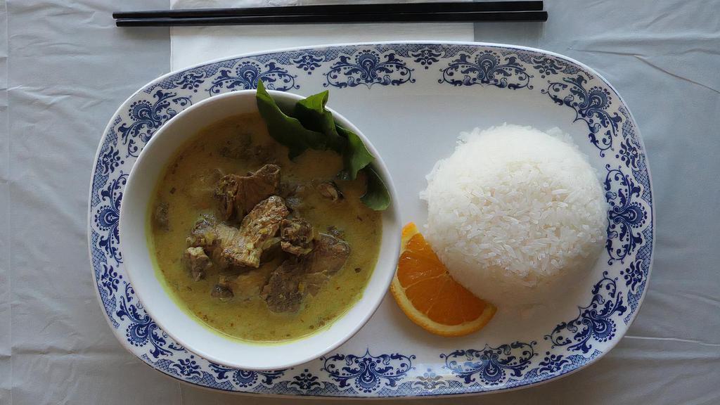 #32. Yellow Curry Chicken · Gluten-free. Spicy. Special homemade curry paste made from scratch (contains 8 high- antioxidant spices) simmered with fresh broth, coconut milk and sweet potato. Served with steamed rice.
