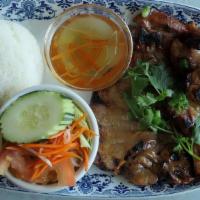 #67. BBQ Chicken · Grilled marinated boneless chicken thighs served with steamed rice and green salad.