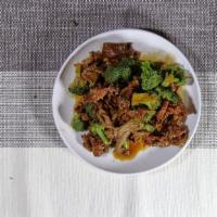 #69. Stir Fried Beef Broccoli · Marinated beef stir-fried with broccoli in a homemade sauce. Served with steamed rice.