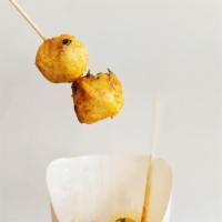Curry Golden Fishball 10pcs · Spicy Malaysian style house marinated curry sauce serves with 10pcs golden fish balls.