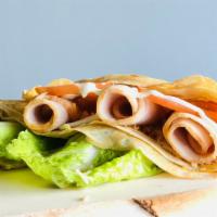 Turkey Breast Crepe · Serves with Turkey Breast, Cheese, Lettuce,  and Tomatoes serves in Mayonnaise.