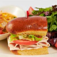 Renee'S Fresh Turkey Sandwich Special · One-Half of a Freshly Roasted Turkey Sandwich, a Cup of Soup and a Small Green Salad