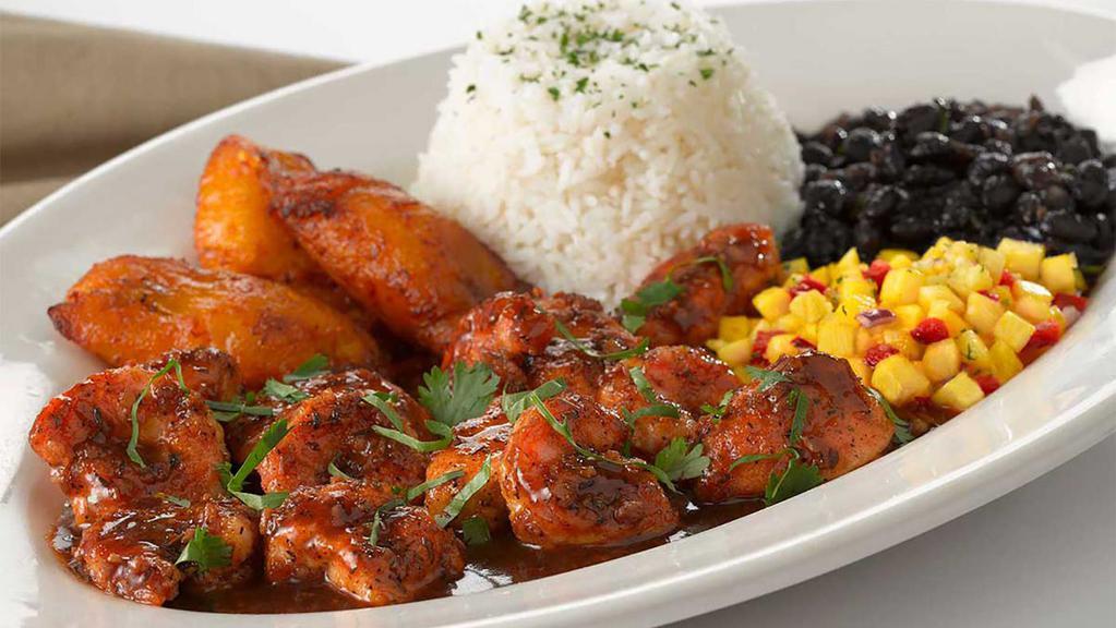 Jamaican Black Pepper Shrimp · Sauteed Shrimp with a Very Spicy Jamaican Black Pepper Sauce. Served with Rice, Black Beans, Plantains and Marinated Pineapple