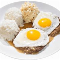 17. Loco Moco · Savory homemade hamburger patties over rice covered with brown gravy and topped with eggs. S...
