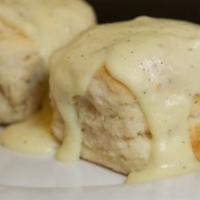 Biscuits & Sausage Gravy · Two of our home-style buttermilk biscuits smothered in our home made country gravy.