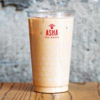 Hong Kong Milk Tea · Strong house black tea with half & half and house-made condensed milk. No milk substitutions.