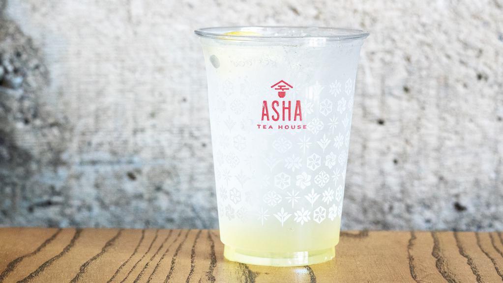 Sparkling Ginger Lemonade · Sparkling water with house-made ginger extract and lemon gimlet. Lightly sweetened.