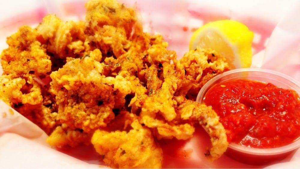 Calamari · Rings and tenticles lightly breaded, seasoned and fried to perfection.