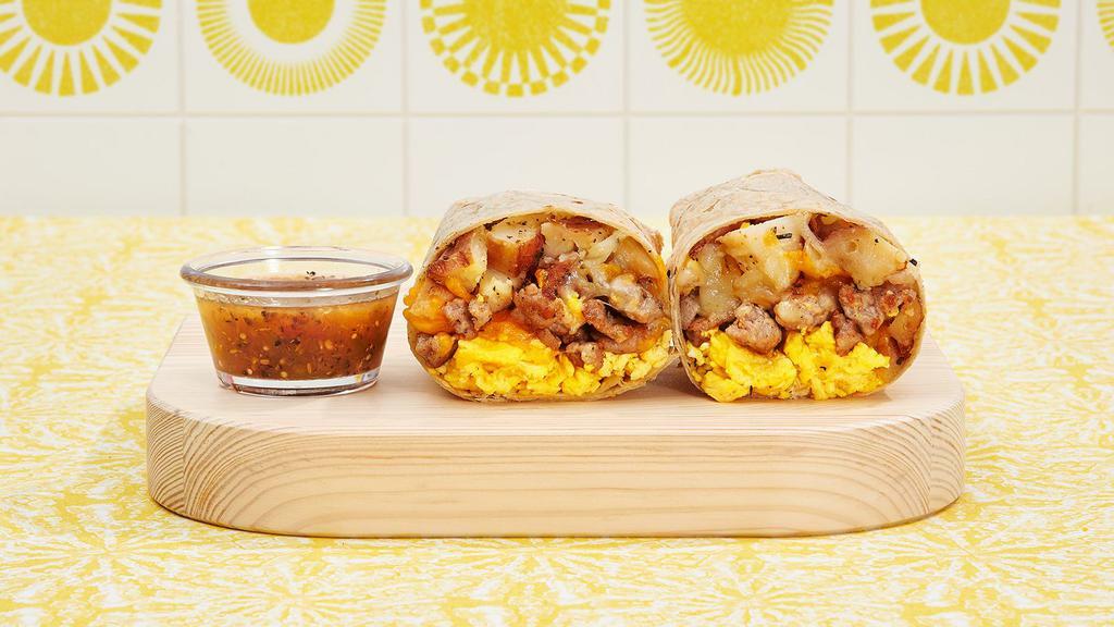 Sausage Breakfast Burrito · Two scrambled eggs, sausage, tater tots, and melted cheese wrapped in a fresh flour tortilla.