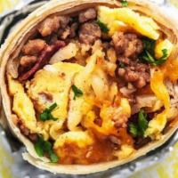 Turkey Sausage Breakfast Burrito · Two scrambled eggs, turkey sausage, tater tots, and melted cheese wrapped in a fresh flour t...