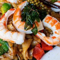 Kemao Beyond Goong  · Stir fried wide rice noodle with vegan shrimp, basil, 
finger root, onion, peppercorn, bell ...