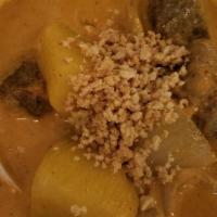 Massamun Nuer  · Stew-cook beef, potatoes, onions, carrots,  and crushed peanuts in massamun paste and tamari...