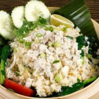 Khao Pad Pu · Thai Style Blue crab fried rice, onion, green onion, eggs, and broccoli. Served with our 