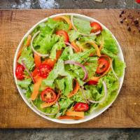 Green Team Salad · Romaine lettuce, cherry tomatoes, carrots, and onions dressed tossed with lemon juice & oliv...