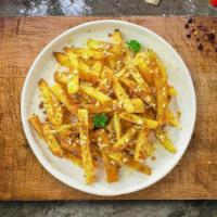 Go Go Garlic Parm Fries · Idaho potato fries cooked until golden brown and garnished with garlic, salt, and parmesan c...