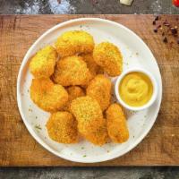 Nugget O'Cluck · Bite sized nuggets of chicken breaded and fried until golden brown. Served with your choice ...