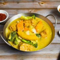 Curry Pumpkin Tofu & Mixed Vegetables (Gluten Free) · Market pumpkin, tofu, and mixed vegetables cooked in a curry. Gluten free.