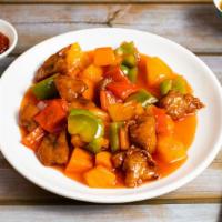Sweet & Sour Vegan Chicken W/ Bell Peppers & Pineapple · Vegan chicken and fresh vegetables cooked in a sweet & sour gravy.