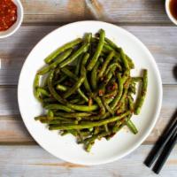 Spicy String Beans · Braised string beans cooked in a spicy chinese sauce.