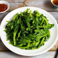 Stir Fried Pea Sprouts · Stir fried fresh pea sprouts with ginger. Gluten free.