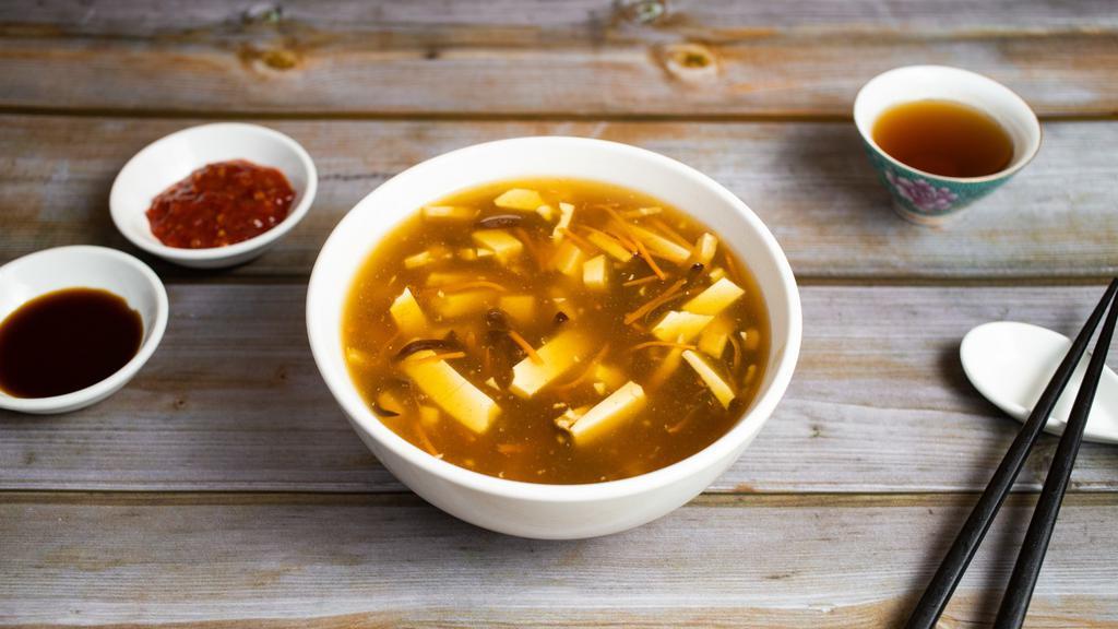 Hot & Sour Soup · Tofu, vegan chicken, mushroom, soy sauce, in a spicy and sour blend.