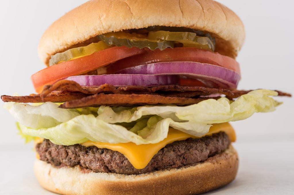 Bacon Cheeseburger · Crispy hardwood smoked bacon w/ American cheese .  100% certified Angus chuck freshly ground daily on premises. All of our burgers are cooked fresh to order.

We do not add salt to our hamburger patties and french fries.