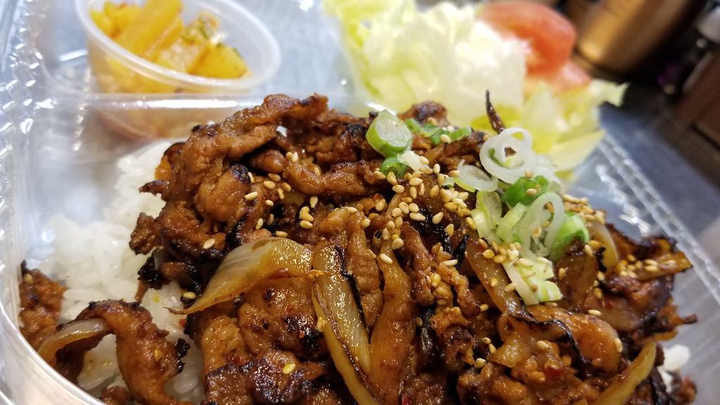 Spicy Pork over rice · Thinly sliced premium pork marinated in house special sauce.