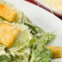 CHOPPED CAESAR SALAD · Chopped romaine lettuce,  parmesan cheese ,croutons, with caesar dressing.