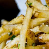 TRUFFLE FRIES · Parmesan ,chives.