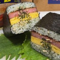 Spam Tamago Musubi · Original spam with tamago (sweet egg cake) between furikake rice, wrapped in seaweed. 1 full...