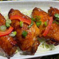 Fish Sauce  Chicken Wings · Umami flavored chicken wings marinated in garlic and fish sauce (4 pieces).